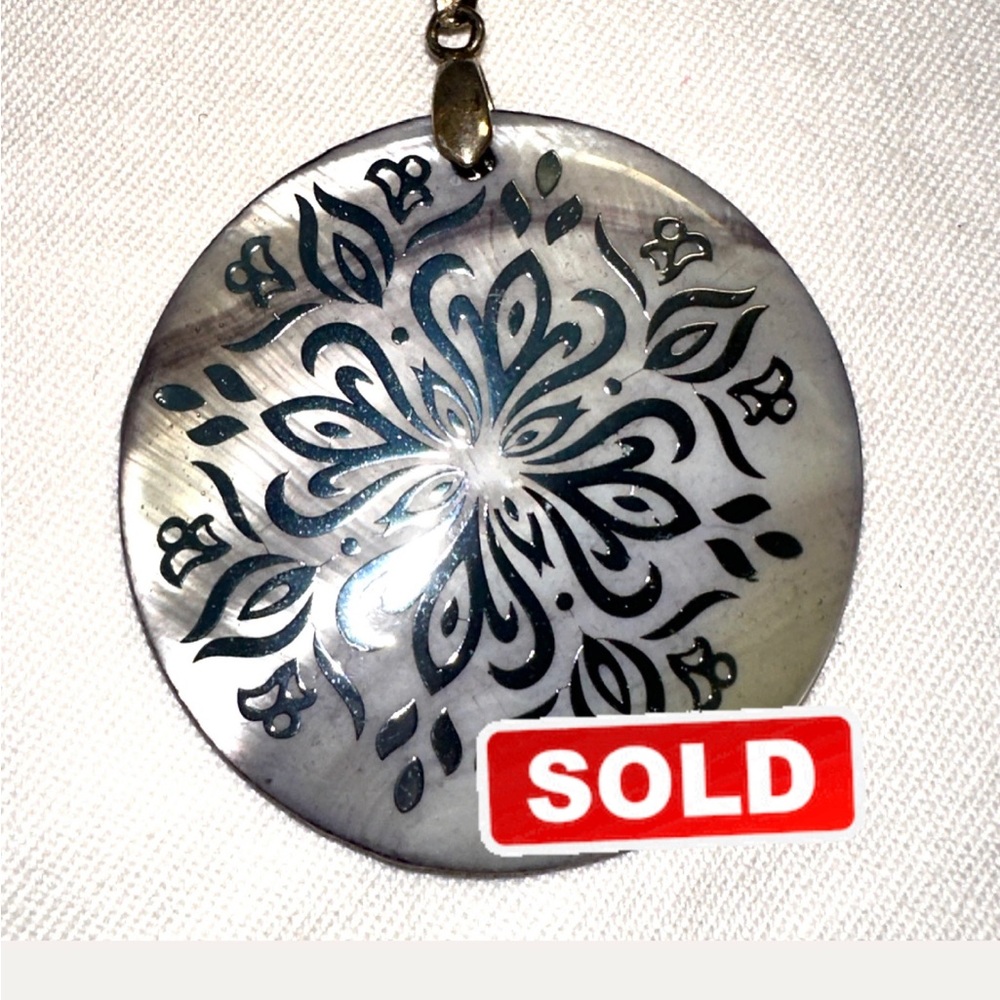 Handmade artisan pendant — mother of pearl with silver tone chain